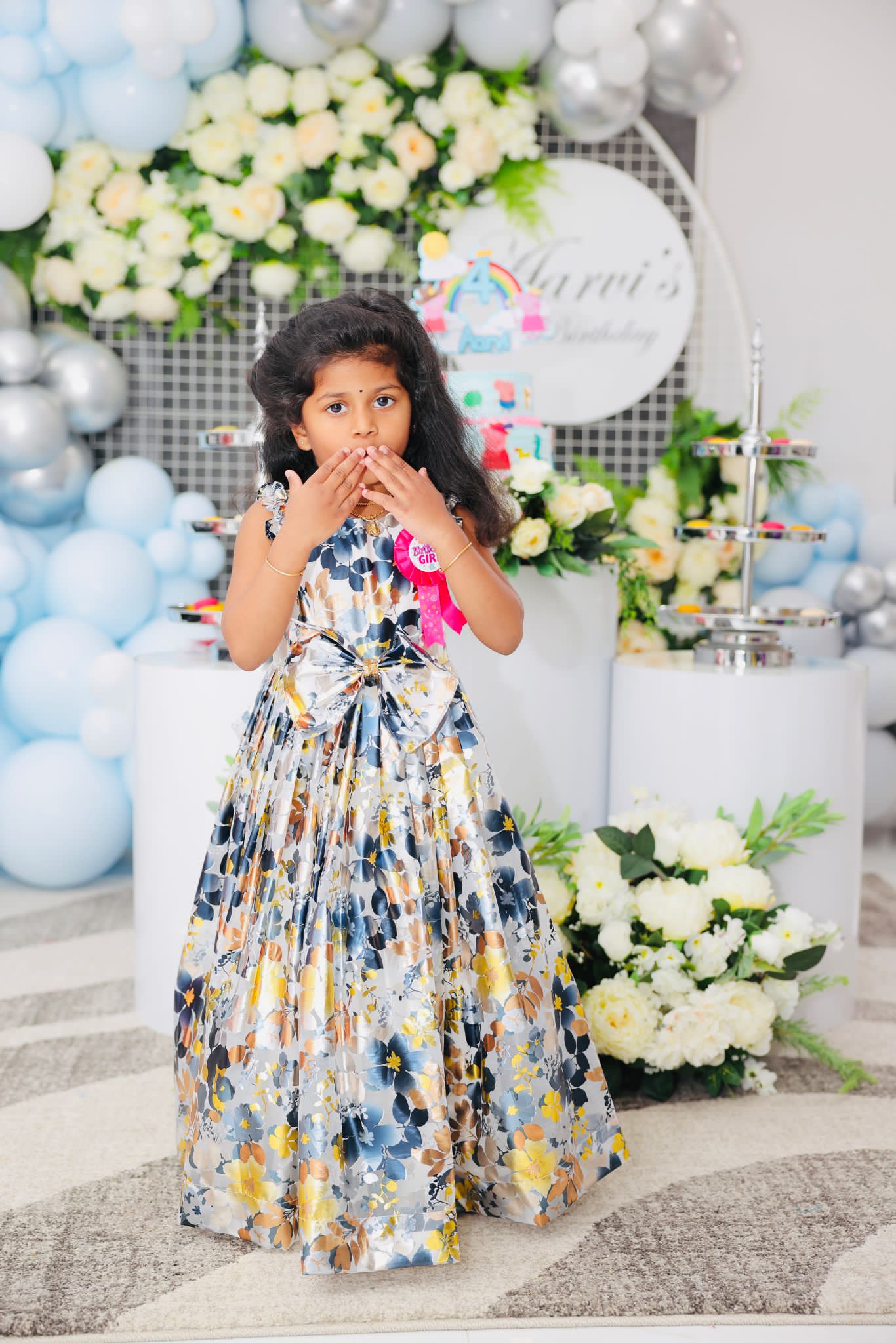 Full-length girls party gown in a soft multicolor floral print